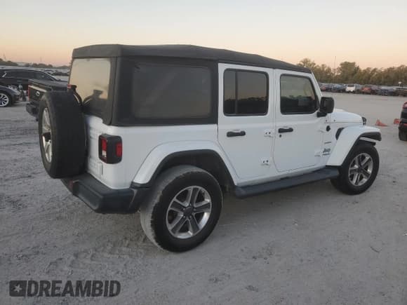 ✅ 2020 Jeep Wrangler Unlimited Sahara • VIN: 1C4HJXEN0LW220544 • Лот: 87453545. Опубликован ранее на Copart с пробегом 78 387 миль. Бесплатный доступ к архиву аукционных продаж из США и подробный отчёт об истории автомобиля на DreamBid. Изображение 3.