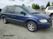 2002 Dodge Caravan EX with VIN 2B8GP74L42R567968, listed as a Copart auction lot 56639355 with 168,252 mi miles and Salvage title. Bid and sale history available at DreamBid. Image 4.