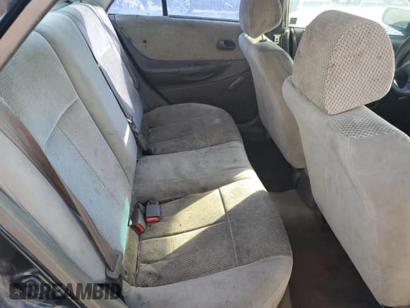 ✅ 1999 Mazda Protege DX • VIN: JM1BJ2221X0172757 • Lot: 75818584. Wystawiony na Copart z przebiegiem 278 032 mil. Bezpłatny archiwum sprzedaży aukcyjnych z USA i szczegółowy raport historii pojazdu na DreamBid. Zdjęcie 11.