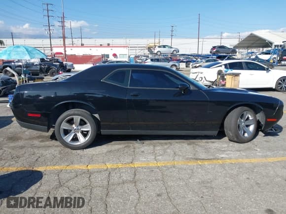 ✅ 2015 Dodge Challenger SXT • VIN: 2C3CDZAG1FH811459 • Lot: 43507040. Listed on IAAI with 121,268 mi. Free auction sales archive from the USA and detailed vehicle history report at DreamBid. Image 14.