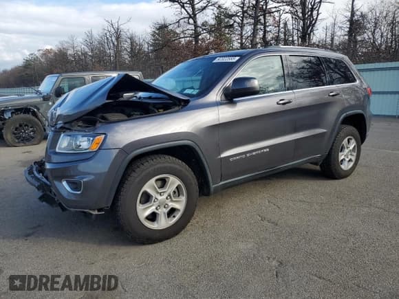 ✅ 2014 Jeep Grand Cherokee Laredo • VIN: 1C4RJFAG3EC315013 • Lot: 92322555. Listed on Copart with 107,305 mi. Free auction sales archive from the USA and detailed vehicle history report at DreamBid. Image 1.