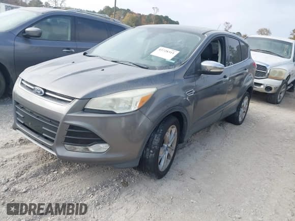 ✅ 2013 Ford Escape SEL • VIN: 1FMCU9H96DUC36882 • Lot: 43728311. Wystawiony na IAAI z przebiegiem 191 896 mil. Bezpłatny archiwum sprzedaży aukcyjnych z USA i szczegółowy raport historii pojazdu na DreamBid. Zdjęcie 2.