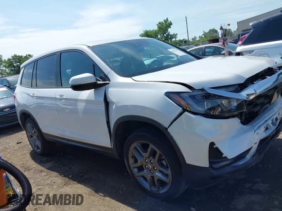 ✅ 2023 Honda Passport EX-L • VIN: 5FNYF8H53PB008136 • Lot: 42813797. Listed on IAAI with 26,970 mi. Free auction sales archive from the USA and detailed vehicle history report at DreamBid. Image 13.