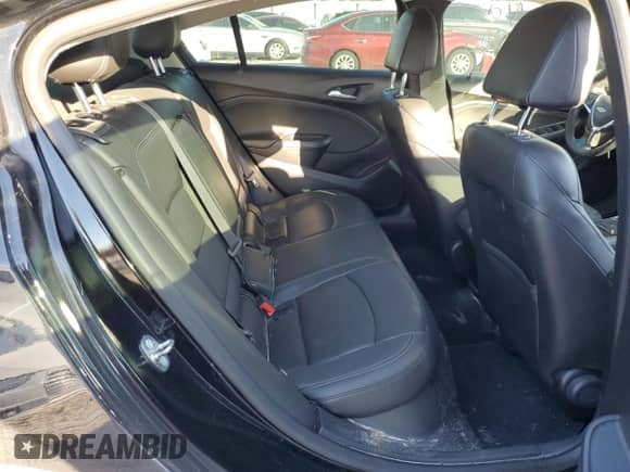 2016 Chevrolet Cruze Premier z VIN 1G1BG5SM3G7278712, wystawiony jako Copart lot #62579392 z przebiegiem Nie podano mil oraz . Historia ofert i sprzedaży dostępna na DreamBid. Obrazek 6.