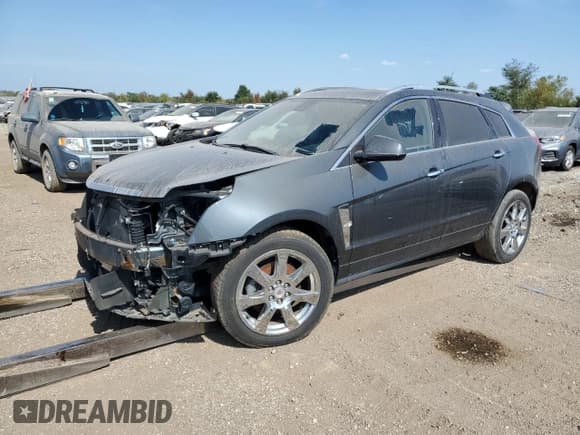 ✅ 2012 Cadillac SRX Performance Collection • VIN: 3GYFNBE39CS617477 • Lot: 72263264. Listed on Copart with 97,675 mi. Free auction sales archive from the USA and detailed vehicle history report at DreamBid. Image 1.
