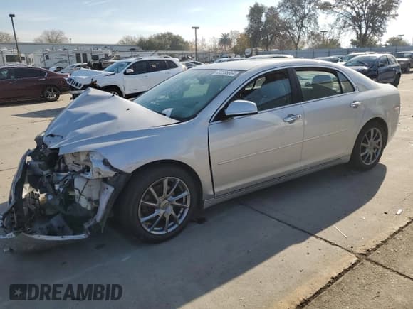 ✅ 2012 Chevrolet Malibu 2LT • VIN: 1G1ZD5E04CF140399 • Lot: 83236864. Listed on Copart with 123,410 mi. Free auction sales archive from the USA and detailed vehicle history report at DreamBid. Image 1.