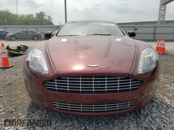 ✅ 2012 Aston Martin Rapide • VIN: SCFHDDAJXCGF03220 • Lot: 58703674. Wystawiony na Copart z przebiegiem 34 402 mil. Bezpłatny archiwum sprzedaży aukcyjnych z USA i szczegółowy raport historii pojazdu na DreamBid. Zdjęcie 5.