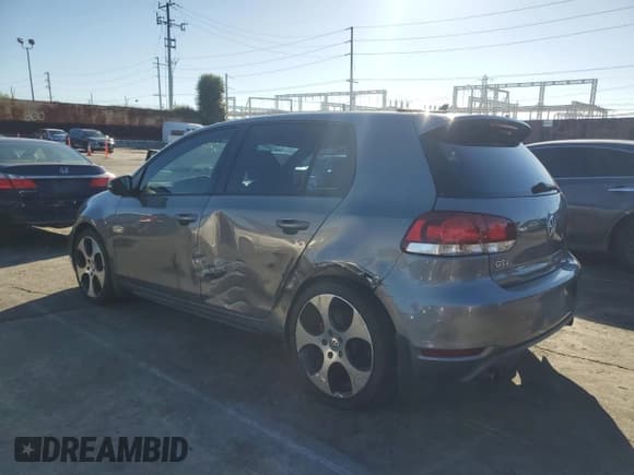 ✅ 2012 Volkswagen Golf GTI Autobahn • VIN: WVWHD7AJ7CW209616 • Lot: 86819705. Listed on Copart with 95,899 mi. Free auction sales archive from the USA and detailed vehicle history report at DreamBid. Image 2.