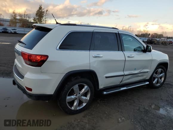 ✅ 2012 Jeep Grand Cherokee Overland • VIN: 1C4RJFCT1CC343268 • Лот: 84906605. Опубликован ранее на Copart с пробегом 211 445 миль. Бесплатный доступ к архиву аукционных продаж из США и подробный отчёт об истории автомобиля на DreamBid. Изображение 3.
