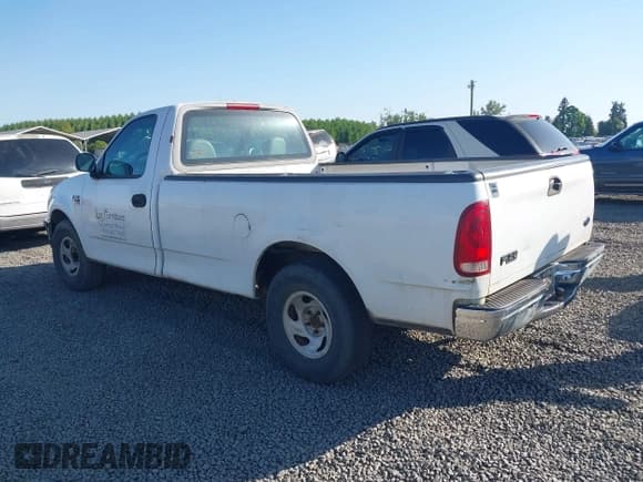 ✅ 1998 Ford F-150 • VIN: 2FTRF176XWCA94878 • Lot: 42128179. Listed on IAAI with 180,791 mi. Free auction sales archive from the USA and detailed vehicle history report at DreamBid. Image 3.
