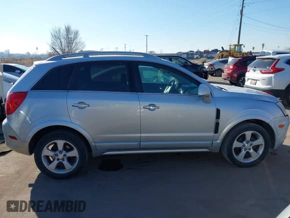 ✅ 2015 Chevrolet Captiva Sport LT • VIN: 3GNAL3EKXFS519539 • Lot: 41460325. Wystawiony na IAAI z przebiegiem 83 009 mil. Bezpłatny archiwum sprzedaży aukcyjnych z USA i szczegółowy raport historii pojazdu na DreamBid. Zdjęcie 13.