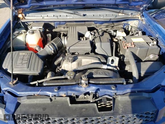 2012 Chevrolet Colorado Work Truck with VIN 1GCGTBFE3C8125018, listed as a Copart auction lot 90024745 with 156,864 mi miles and Salvage title. Bid and sale history available at DreamBid. Image 11.