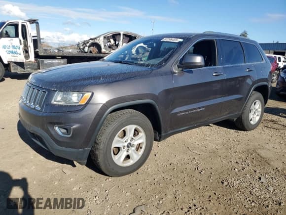 ✅ 2015 Jeep Grand Cherokee Laredo • VIN: 1C4RJFAG4FC793992 • Lot: 87296455. Listed on Copart with 234,821 mi. Free auction sales archive from the USA and detailed vehicle history report at DreamBid. Image 1.