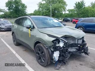 ✅ 2025 Kia Sportage X-Line Prestige • VIN: KNDPZDDH2S7206359 • Лот: 42495894. Опубликован ранее на IAAI с пробегом 1 209 миль. Бесплатный доступ к архиву аукционных продаж из США и подробный отчёт об истории автомобиля на DreamBid. Изображение 1.