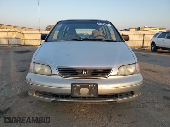 ✅ 1997 Honda Odyssey • VIN: JHMRA1842VC003732 • Lot: 86205204. Listed on Copart with 136,693 mi. Free auction sales archive from the USA and detailed vehicle history report at DreamBid. Image 5.