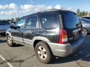 ✅ 2002 Mazda Tribute LX • VIN: 4F2YU09192KM66147 • Лот: 86491595. Опубликован ранее на Copart с пробегом 217 251 миль. Бесплатный доступ к архиву аукционных продаж из США и подробный отчёт об истории автомобиля на DreamBid. Изображение 2.
