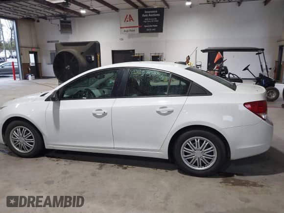 2015 Chevrolet Cruze LS z VIN 1G1PA5SH4F7209231, wystawiony jako IAAI lot #43335340 z przebiegiem 137 165 mil mil oraz . Historia ofert i sprzedaży dostępna na DreamBid. Obrazek 14.