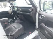 ✅ 2023 Jeep Wrangler Sahara • VIN: 1C4JJXP67PW604835 • Lot: 42431648. Listed on IAAI with 15,209 mi. Free auction sales archive from the USA and detailed vehicle history report at DreamBid. Image 5.