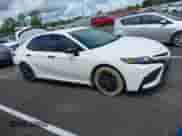 2022 Toyota Camry SE z VIN 4T1T11AK3NU066747, wystawiony jako IAAI lot #42347249 z przebiegiem 112 765 mil mil oraz . Historia ofert i sprzedaży dostępna na DreamBid. Obrazek 13.