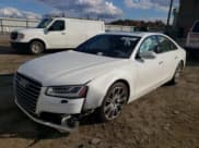 ✅ 2015 Audi A8 4.0T • VIN: WAUJ2AFD3FN005524 • Лот: 65610982. Опубликован ранее на Copart с пробегом 105 627 миль. Бесплатный доступ к архиву аукционных продаж из США и подробный отчёт об истории автомобиля на DreamBid. Изображение 2.