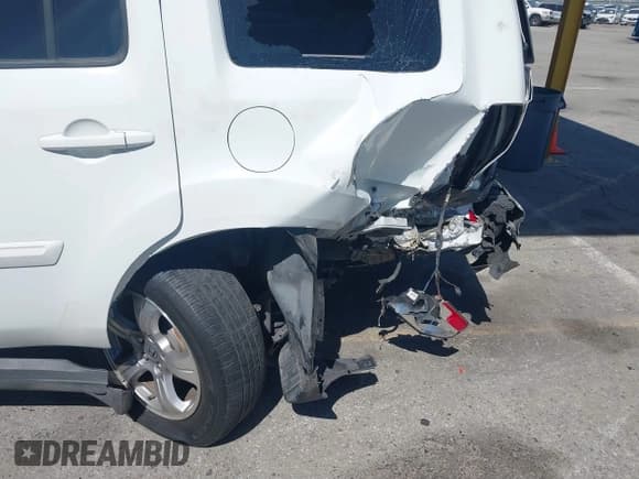 ✅ 2013 Honda Pilot EX-L • VIN: 5FNYF3H51DB013964 • Lot: 41831598. Listed on IAAI with 155,959 mi. Free auction sales archive from the USA and detailed vehicle history report at DreamBid. Image 6.