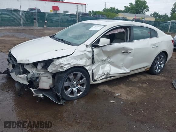 ✅ 2012 Buick LaCrosse Premium 2 • VIN: 1G4GF5E38CF218939 • Lot: 42522959. Wystawiony na IAAI z przebiegiem 210 719 mil. Bezpłatny archiwum sprzedaży aukcyjnych z USA i szczegółowy raport historii pojazdu na DreamBid. Zdjęcie 6.