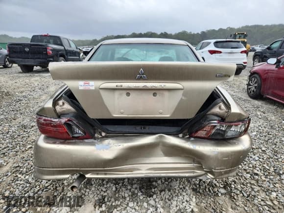 ✅ 2003 Mitsubishi Galant ES • VIN: 4A3AA46GX3E055881 • Lot: 85665575. Listed on Copart with Not provided. Free auction sales archive from the USA and detailed vehicle history report at DreamBid. Image 6.