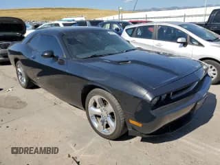 ✅ 2013 Dodge Challenger R/T • VIN: 2C3CDYBTXDH650998 • Lot: 69681514. Wystawiony na Copart z przebiegiem 130 553 mil. Bezpłatny archiwum sprzedaży aukcyjnych z USA i szczegółowy raport historii pojazdu na DreamBid. Zdjęcie 4.
