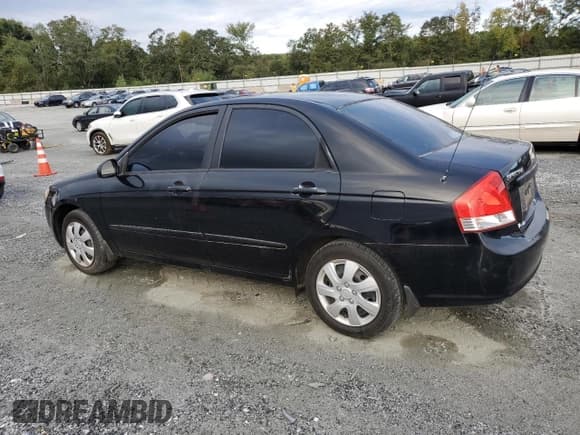 ✅ 2009 Kia Spectra EX • VIN: KNAFE221095634242 • Лот: 84546585. Опубликован ранее на Copart с пробегом 117 203 миль. Бесплатный доступ к архиву аукционных продаж из США и подробный отчёт об истории автомобиля на DreamBid. Изображение 2.
