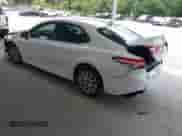 2019 Toyota Camry LE with VIN 4T1B11HK3KU709546, listed as a IAAI auction lot 42836396 with 113,611 mi miles and . Bid and sale history available at DreamBid. Image 3.