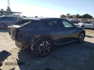 ✅ 2023 Kia EV6 Wind • VIN: KNDC34LA1P5609899 • Лот: 70710494. Опубликован ранее на Copart с пробегом 42 873 миль. Бесплатный доступ к архиву аукционных продаж из США и подробный отчёт об истории автомобиля на DreamBid. Изображение 3.