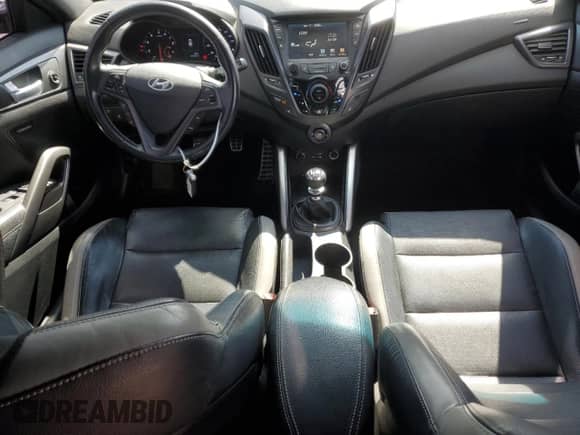 2016 Hyundai Veloster Turbo z VIN KMHTC6AE5GU252388, wystawiony jako Copart lot #48964145 z przebiegiem 137 421 mil mil oraz Szkoda całkowita • Salvage title. Historia ofert i sprzedaży dostępna na DreamBid. Obrazek 8.