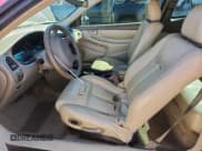 ✅ 2003 Oldsmobile Alero GLS • VIN: 1G3NF12E63C234875 • Lot: 82139325. Listed on Copart with 205,219 mi. Free auction sales archive from the USA and detailed vehicle history report at DreamBid. Image 7.