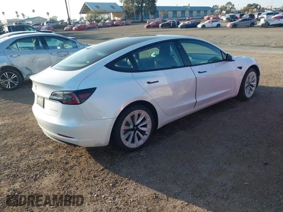 ✅ 2021 Tesla Model 3 Long Range • VIN: 5YJ3E1EB0MF936609 • Lot: 41599411. Listed on IAAI with 55,993 mi. Free auction sales archive from the USA and detailed vehicle history report at DreamBid. Image 4.