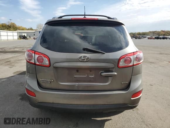✅ 2012 Hyundai Santa Fe SE • VIN: 5XYZHDAGXCG098035 • Lot: 75952204. Listed on Copart with 175,381 mi. Free auction sales archive from the USA and detailed vehicle history report at DreamBid. Image 6.
