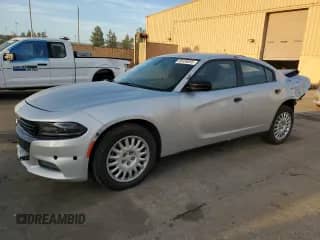 2020 Dodge Charger Police с VIN 2C3CDXKT6LH245763, выставлен на аукционе Copart как лот 85336055 с пробегом 87 606 миль миль и Списание • Salvage title. История ставок и продаж доступна на DreamBid. Изображение 1.