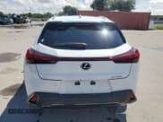 ✅ 2022 Lexus UX 200 F Sport • VIN: JTHE3JBH6N2055584 • Лот: 71727835. Опубликован ранее на Copart с пробегом 28 871 миль. Бесплатный доступ к архиву аукционных продаж из США и подробный отчёт об истории автомобиля на DreamBid. Изображение 6.