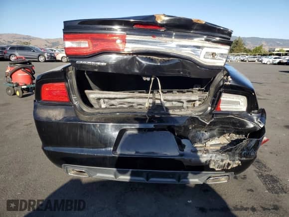 2012 Dodge Charger SE z VIN 2C3CDXBGXCH197655, wystawiony jako Copart lot #82425155 z przebiegiem 180 152 mil mil oraz Szkoda całkowita • Salvage title. Historia ofert i sprzedaży dostępna na DreamBid. Obrazek 6.