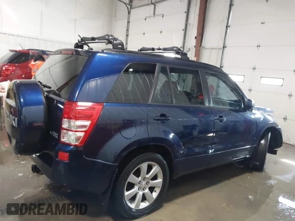 ✅ 2012 Suzuki Grand Vitara Limited • VIN: JS3TD0D76C4100790 • Lot: 41716479. Wystawiony na IAAI z przebiegiem 107 102 mil. Bezpłatny archiwum sprzedaży aukcyjnych z USA i szczegółowy raport historii pojazdu na DreamBid. Zdjęcie 14.