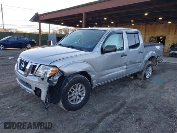✅ 2016 Nissan Frontier S • VIN: 1N6AD0EV0GN767161 • Lot: 41566094. Listed on IAAI with 99,638 mi. Free auction sales archive from the USA and detailed vehicle history report at DreamBid. Image 17.
