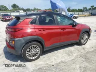 ✅ 2019 Hyundai Kona SEL • VIN: KM8K22AA2KU325147 • Лот: 67642344. Опубликован ранее на Copart с пробегом 72 590 миль. Бесплатный доступ к архиву аукционных продаж из США и подробный отчёт об истории автомобиля на DreamBid. Изображение 3.