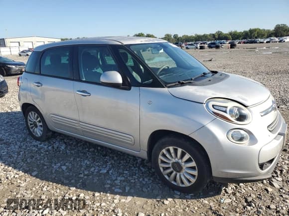 ✅ 2014 FIAT 500L Easy • VIN: ZFBCFABHXEZ013266 • Lot: 81810515. Listed on Copart with 129,247 mi. Free auction sales archive from the USA and detailed vehicle history report at DreamBid. Image 4.