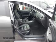 ✅ 2014 Mazda 6 i Grand Touring • VIN: JM1GJ1W68E1152980 • Lot: 42876380. Wystawiony na IAAI z przebiegiem 67 971 mil. Bezpłatny archiwum sprzedaży aukcyjnych z USA i szczegółowy raport historii pojazdu na DreamBid. Zdjęcie 5.