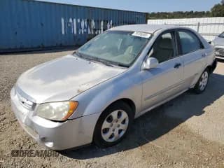 ✅ 2006 Kia Spectra EX • VIN: KNAFE122365310796 • Lot: 70728555. Listed on Copart with 100,114 mi. Free auction sales archive from the USA and detailed vehicle history report at DreamBid. Image 1.