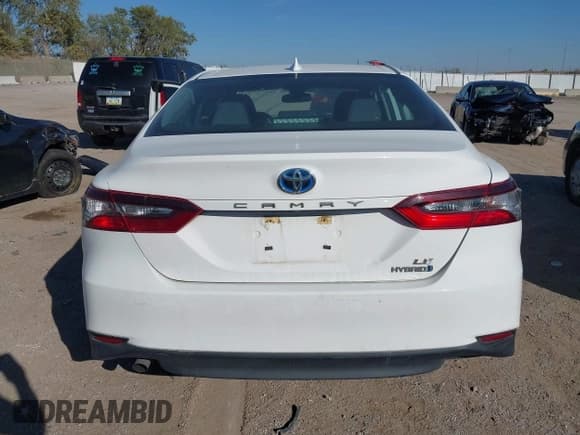 ✅ 2021 Toyota Camry Hybrid LE • VIN: 4T1H31AK3MU566826 • Лот: 43437913. Опубликован ранее на IAAI с пробегом 70 798 миль. Бесплатный доступ к архиву аукционных продаж из США и подробный отчёт об истории автомобиля на DreamBid. Изображение 16.