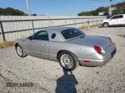 ✅ 2004 Ford Thunderbird Deluxe • VIN: 1FAHP60A44Y101310 • Лот: 82537165. Опубликован ранее на Copart с пробегом 88 559 миль. Бесплатный доступ к архиву аукционных продаж из США и подробный отчёт об истории автомобиля на DreamBid. Изображение 2.
