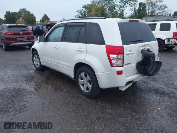✅ 2010 Suzuki Grand Vitara XSport • VIN: JS3TE0D41A4100728 • Lot: 43446177. Listed on IAAI with 102,657 mi. Free auction sales archive from the USA and detailed vehicle history report at DreamBid. Image 3.