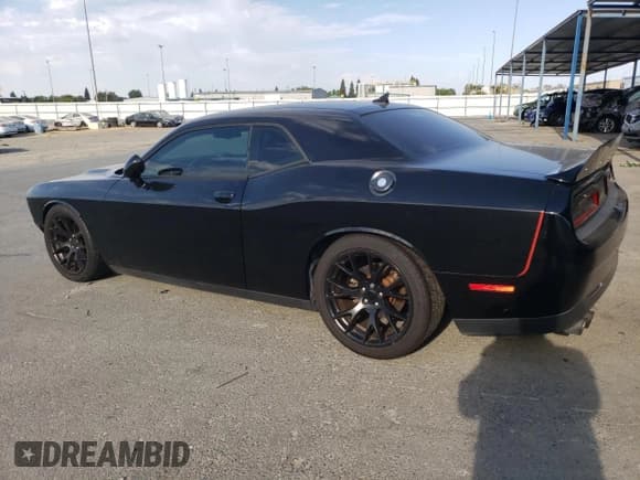 ✅ 2016 Dodge Challenger R/T Plus • VIN: 2C3CDZBTXGH214145 • Lot: 67198765. Listed on Copart with 162,009 mi. Free auction sales archive from the USA and detailed vehicle history report at DreamBid. Image 2.