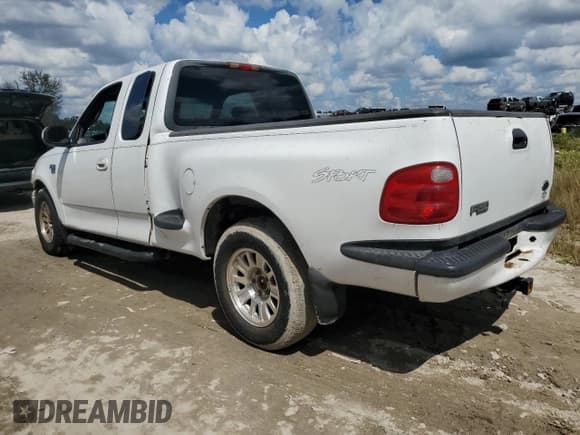 ✅ 2001 Ford F-150 XL • VIN: 1FTRX07L81KF40897 • Lot: 73887094. Listed on Copart with Not provided. Free auction sales archive from the USA and detailed vehicle history report at DreamBid. Image 2.