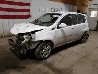 ✅ 2011 Chevrolet Aveo 1LT • VIN: KL1TD6DE4BB210562 • Лот: 48563035. Опубликован ранее на Copart с пробегом 62 545 миль. Бесплатный доступ к архиву аукционных продаж из США и подробный отчёт об истории автомобиля на DreamBid. Изображение 1.